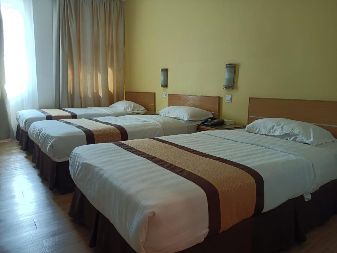 Tang Dynasty Lodge Tuaran Екстер'єр фото